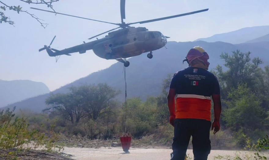 Air Force helicopter combats fire in Xichu