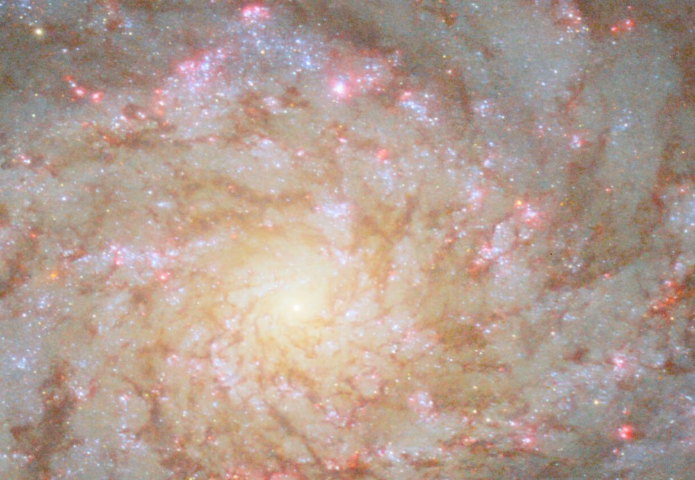 Hubble captures a bright spiral ‘in the Queen’s Hair’